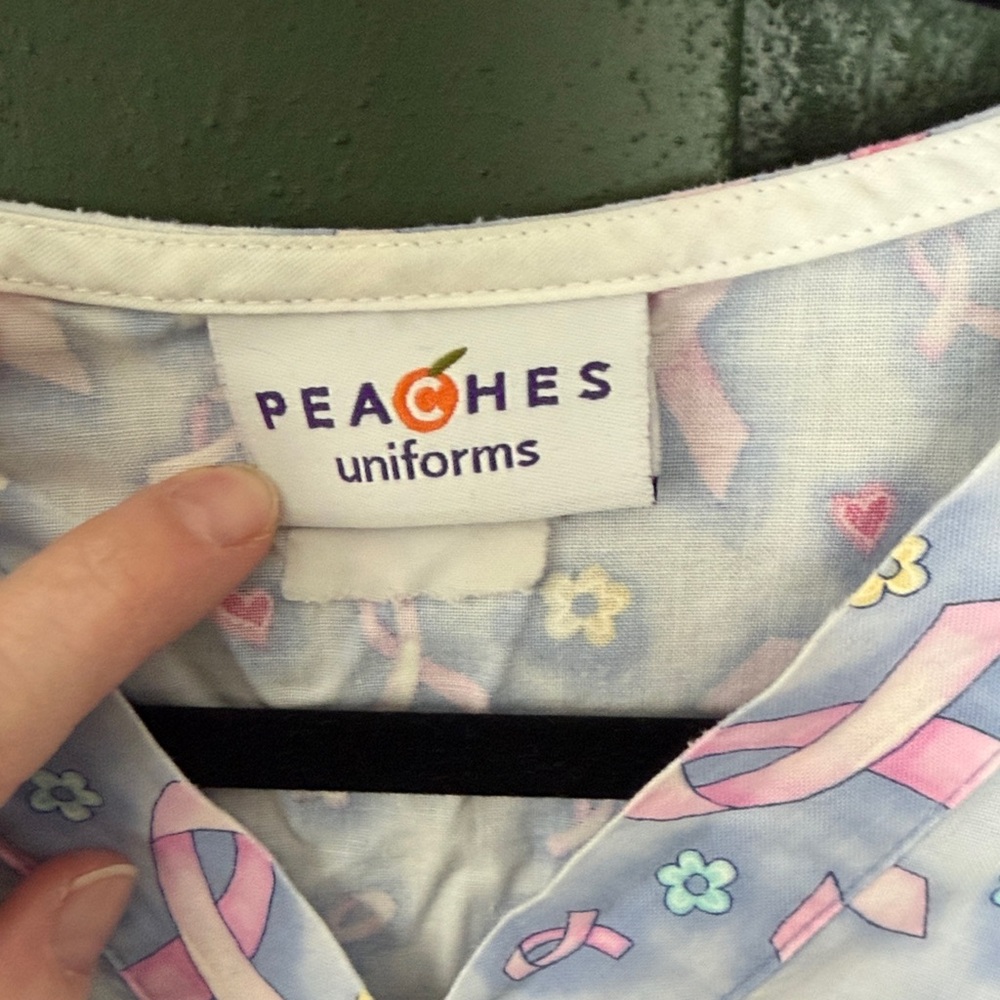 Peaches Uniforms Blue and Pink Ribbon Scrub Top - Picture 2 of 4
